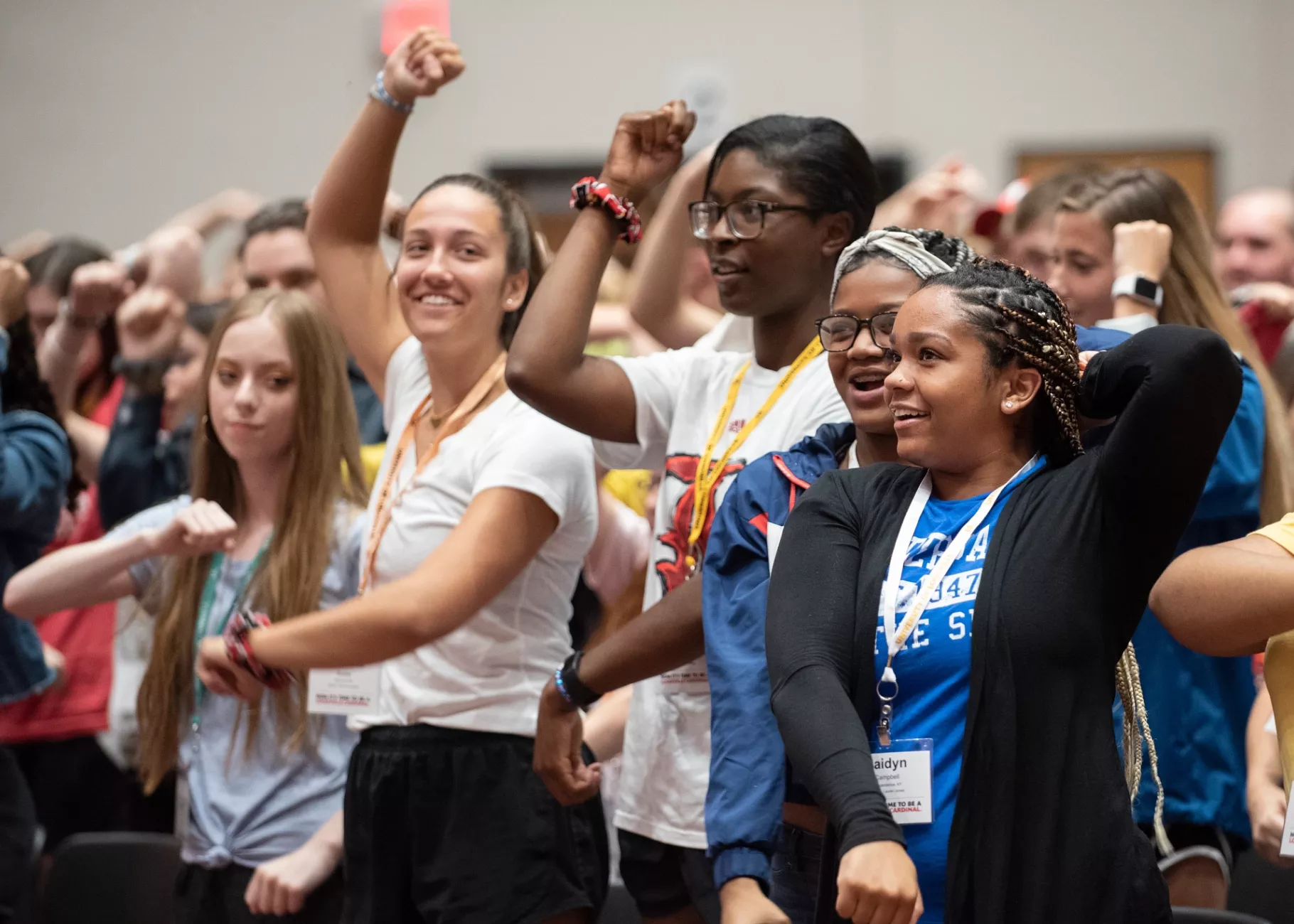First year students at a Welcome Week event performing the CARDS cheer