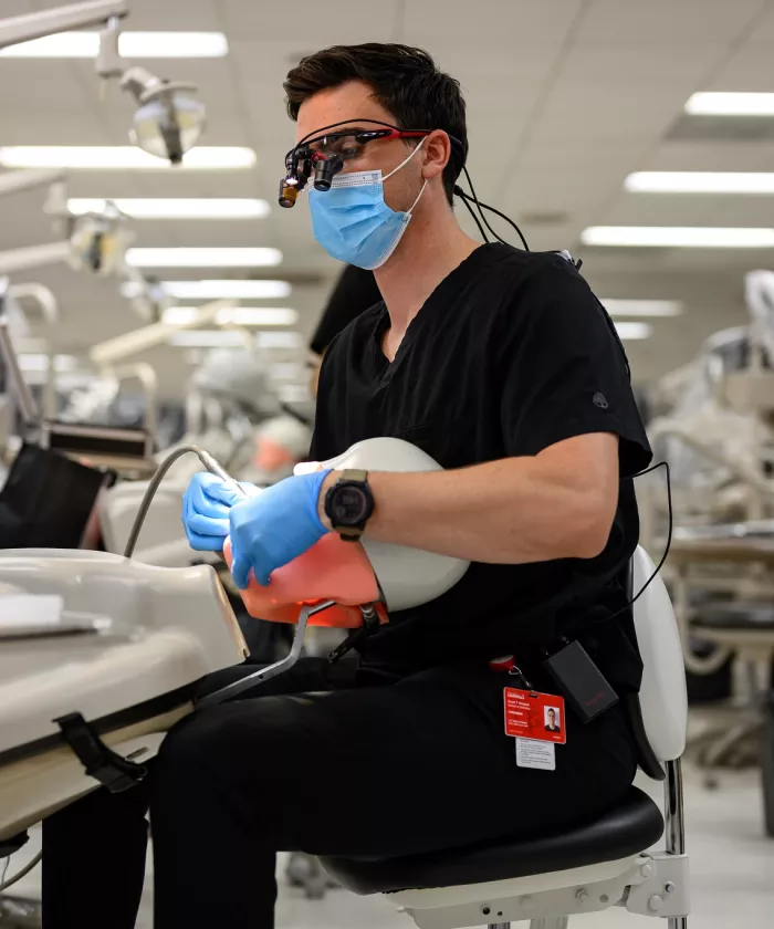 Dental students working in an academic clinic